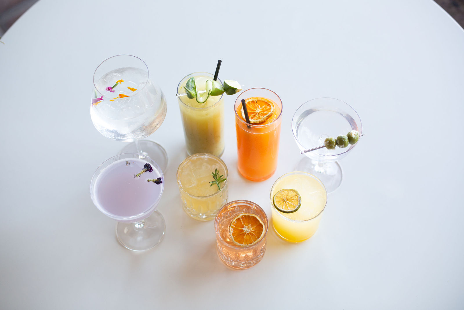 The nine drink lineup on white. The tile she circled carries a video badge, so what she marked is most likely the clip; this is the closest still from the same set-up.