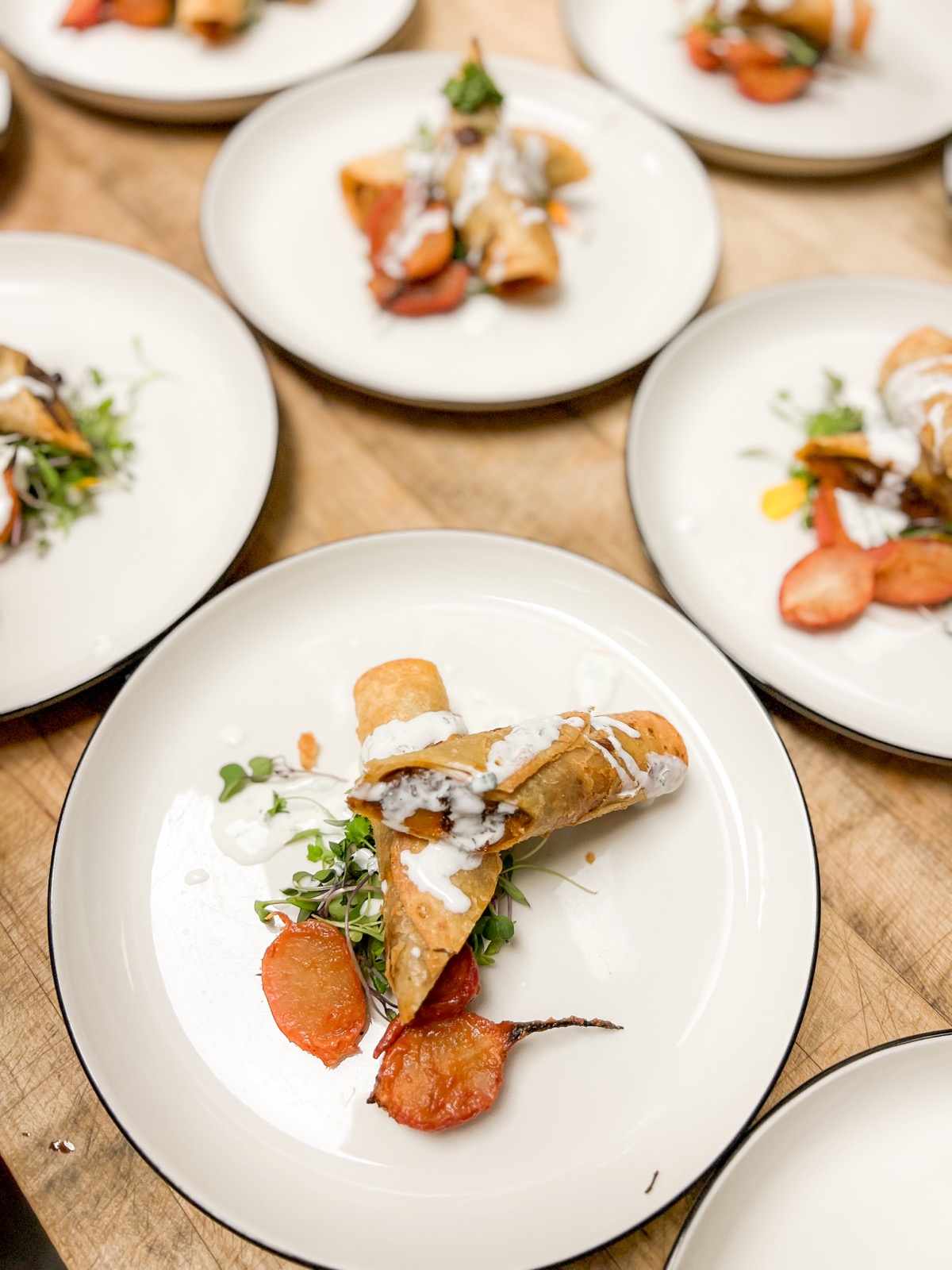 Overhead of the taquito course plated across the table